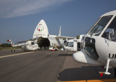 Unloading fresh helicopter, loading retired units